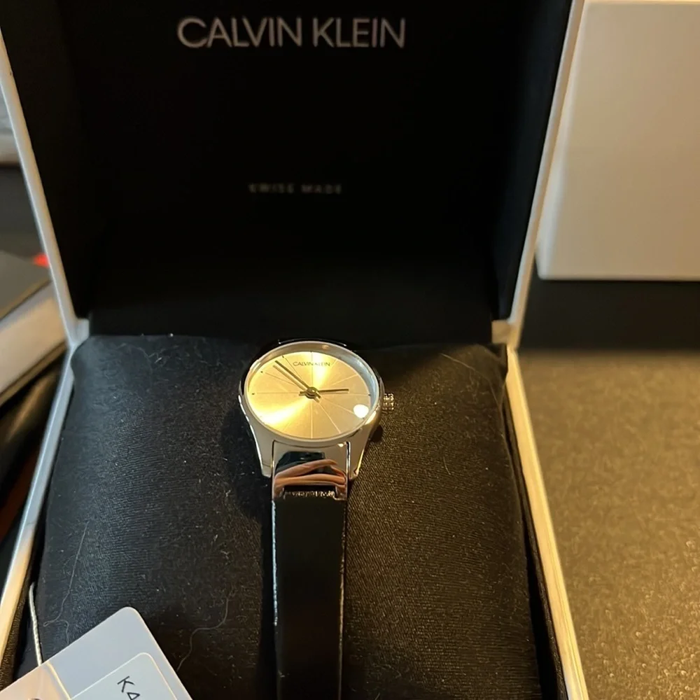 NWT Calvin Klein Swiss made women’s watch with black leather band